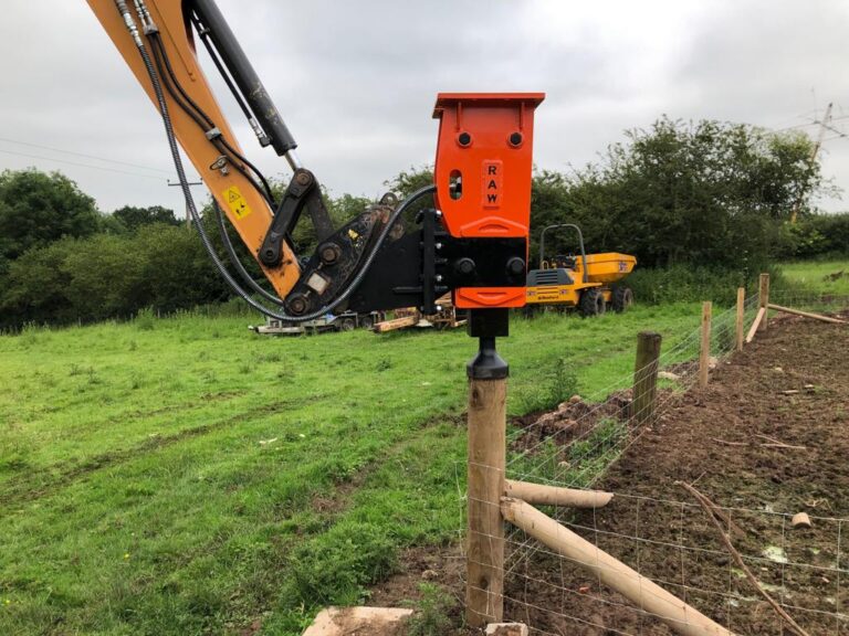 Hydraulic breaker post driver tools and attachments